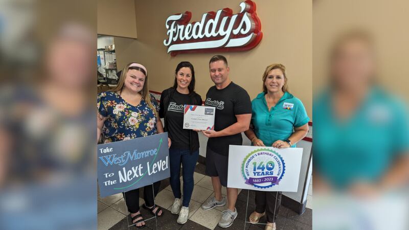 Freddy's staff receiving the "Next Level" award.
