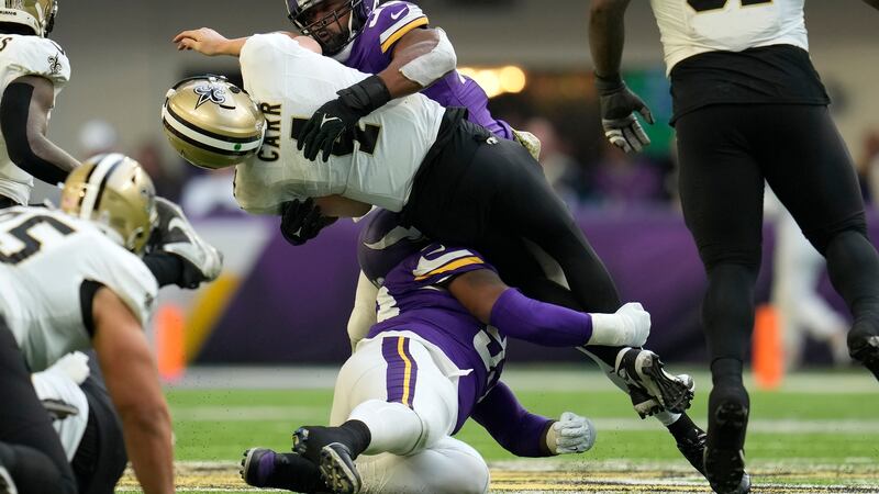 Saints quarterback Derek Carr (4) was knocked out of the game Sunday (Nov. 12) with a shoulder...