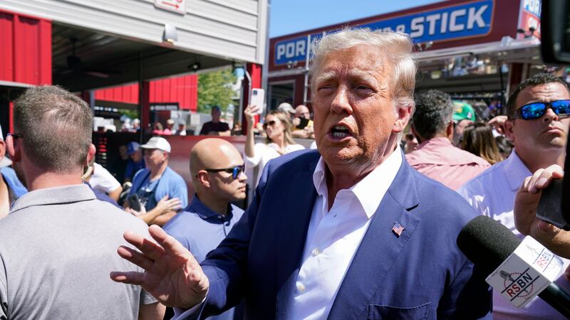 FILE - Republican presidential candidate former President Donald Trump speaks as he visits the...